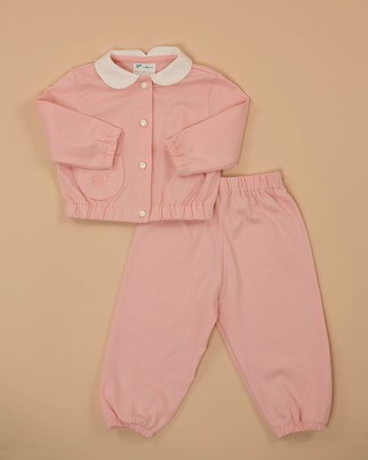 A baby girl's pink two-piece set with a white collar and a button placket, consisting of a sweatshirt and pants.